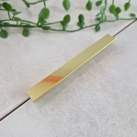 A image of the genesis esa.86 metal tile trim in bright brass finish. Bright brass tile trim available in 10mm and 12mm.