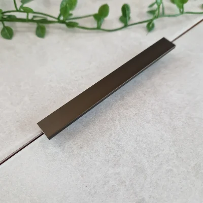 A image of the genesis esa.89 metal tile trim in bronze finish. Brushed bronze tile trim available in 10mm and 12mm.