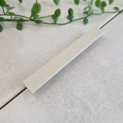 A image of the genesis esa.425 stone effect tile trim in a sand stone finish. sand stone tile trim available in 8mm, 10mm and 12mm.
