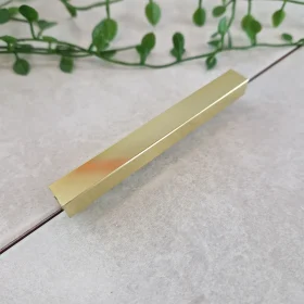 Square tile trim by genesis in bright brass finish, available in depths of 10mm and 12mm.